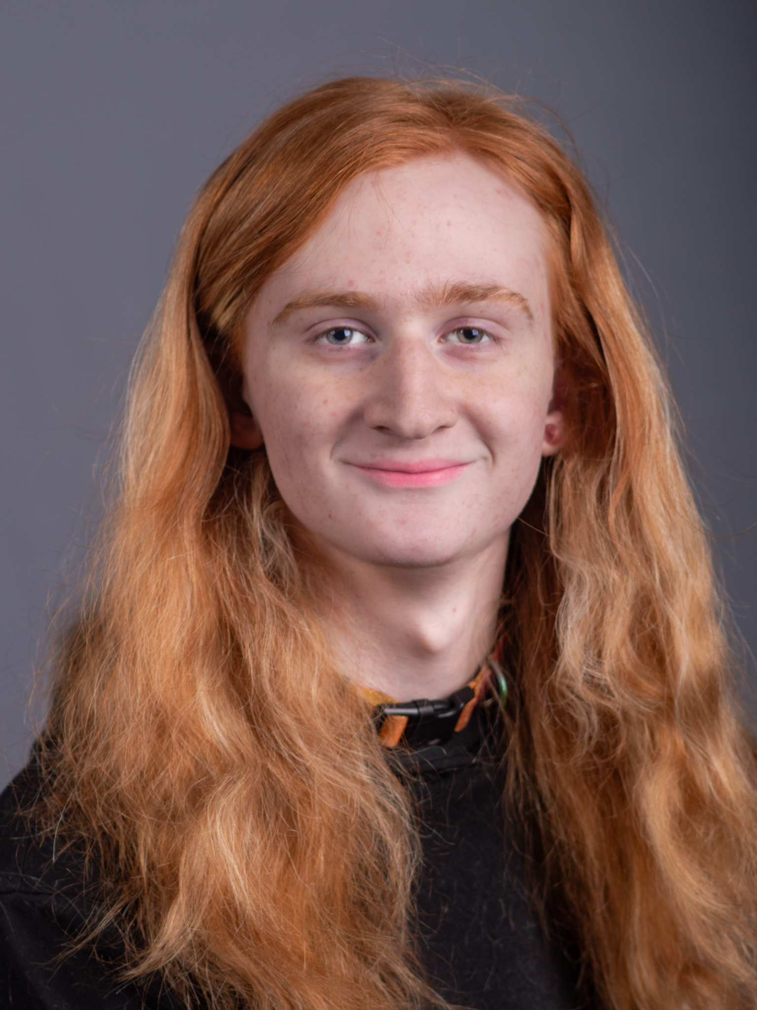 Headshot on gray backdrop